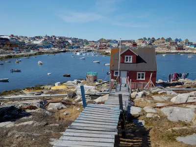 Ships float in Aasiaat&rsquo;s harbor.