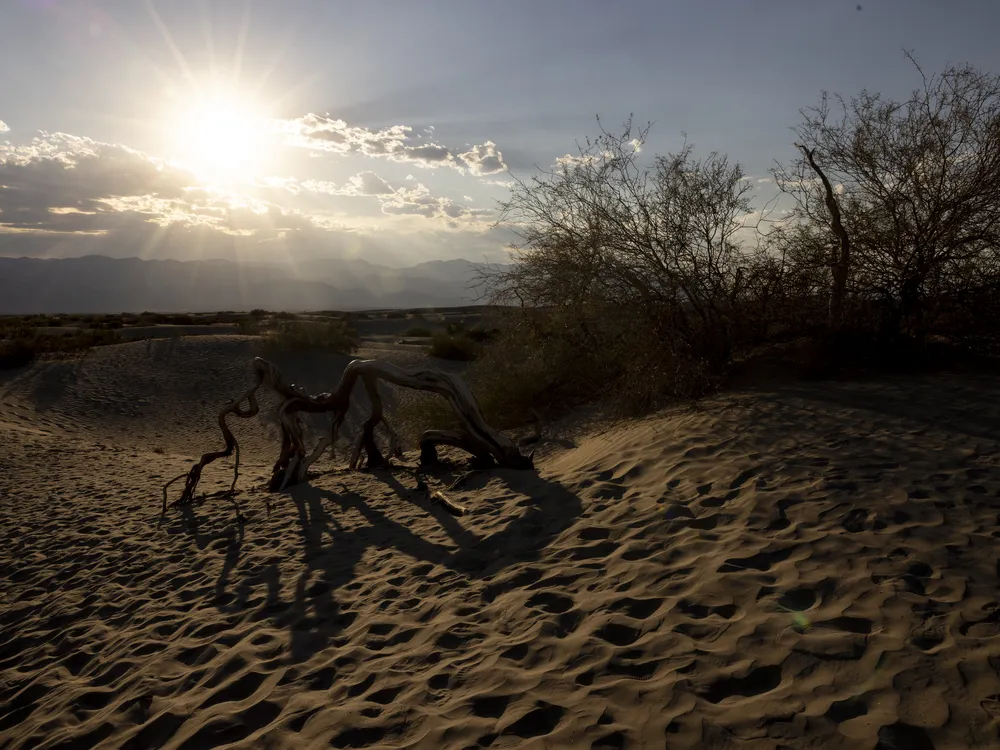the sun sets over Death Valley